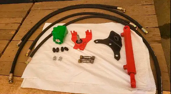 Комплект переобладнання Т-40 насосом дозатором (гідроруль замість ГУРа)