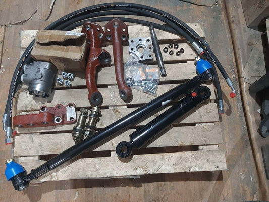 Переобладнення з встановлення дозатора на ГУР з кронштейном (під міст старого зразку з відливкою) МТЗ