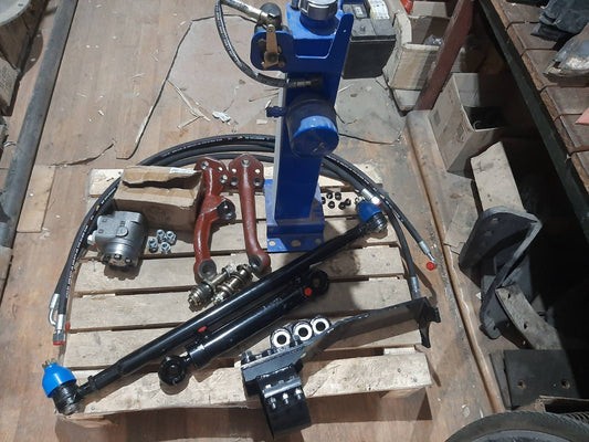 Переобладнення з встановлення дозатора з гідробаком з блокування та з кронштейном (під міст старого зразку