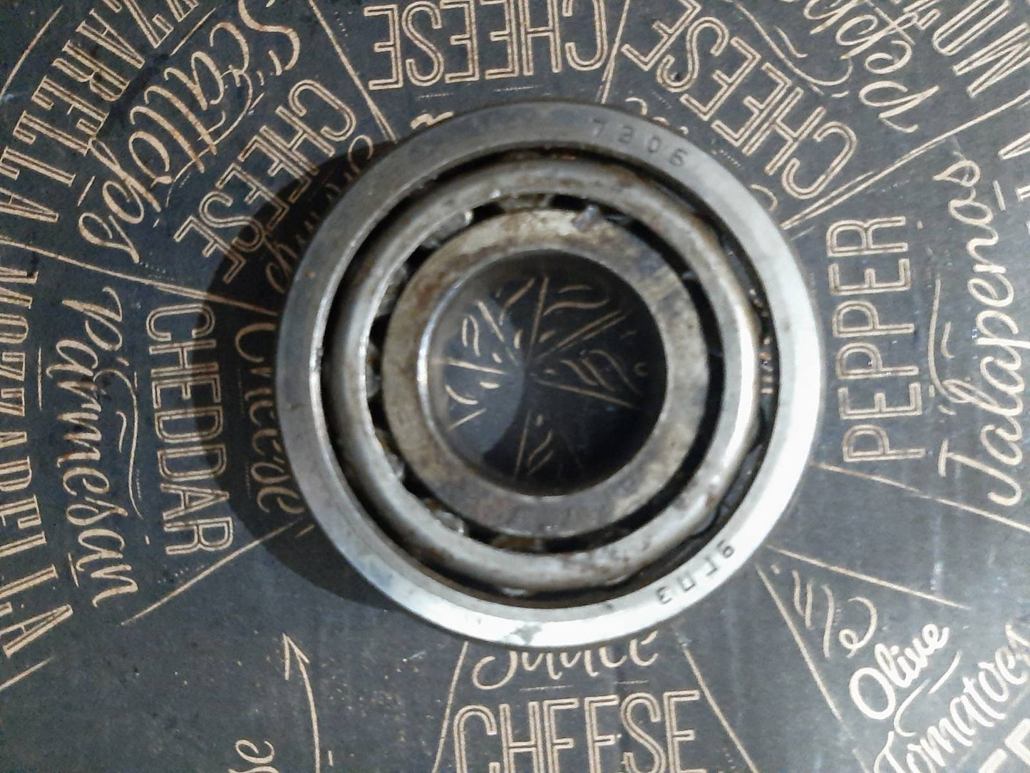 Підшипник 7306